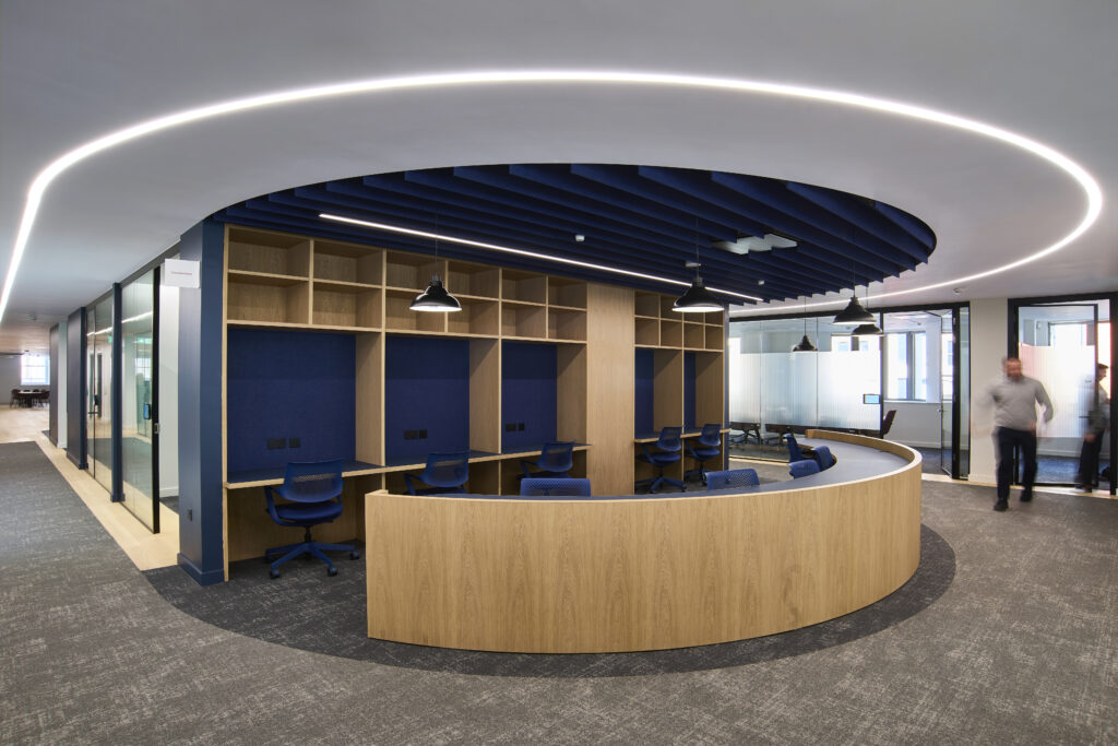 Granite acoustic ceiling baffles in high-traffic open-plan zone