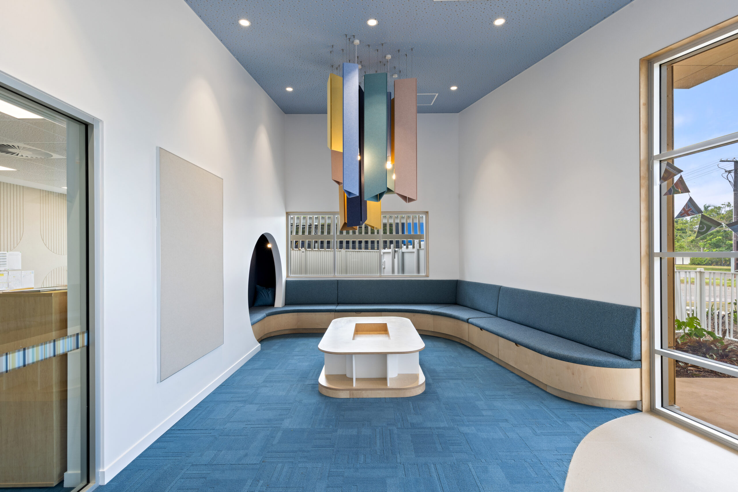 Acoufelt Pendant Ceiling Clouds in Periwinkle, Sea Salt, Turmeric, Valentine, Granite and Wheat installed in Parap Preschool