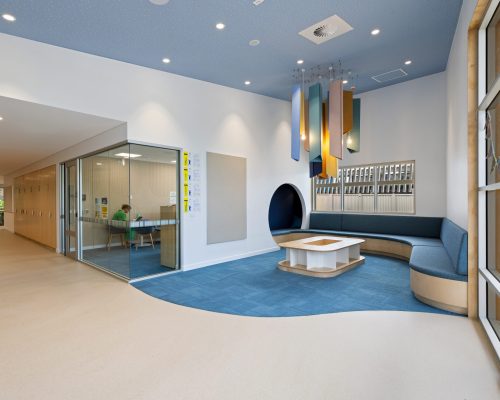 Acoufelt Pendant Ceiling Clouds in Periwinkle, Sea Salt, Turmeric, Valentine, Granite and Wheat installed and Fracture Arch and Solid Wall Panels in Pearl installed in Parap Preschool