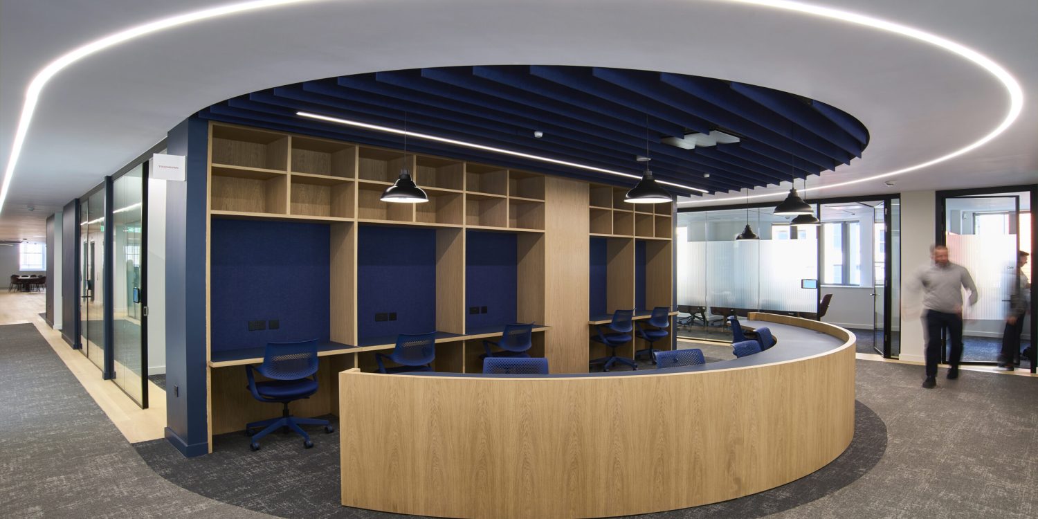 Granite acoustic ceiling baffles in high-traffic open-plan zone